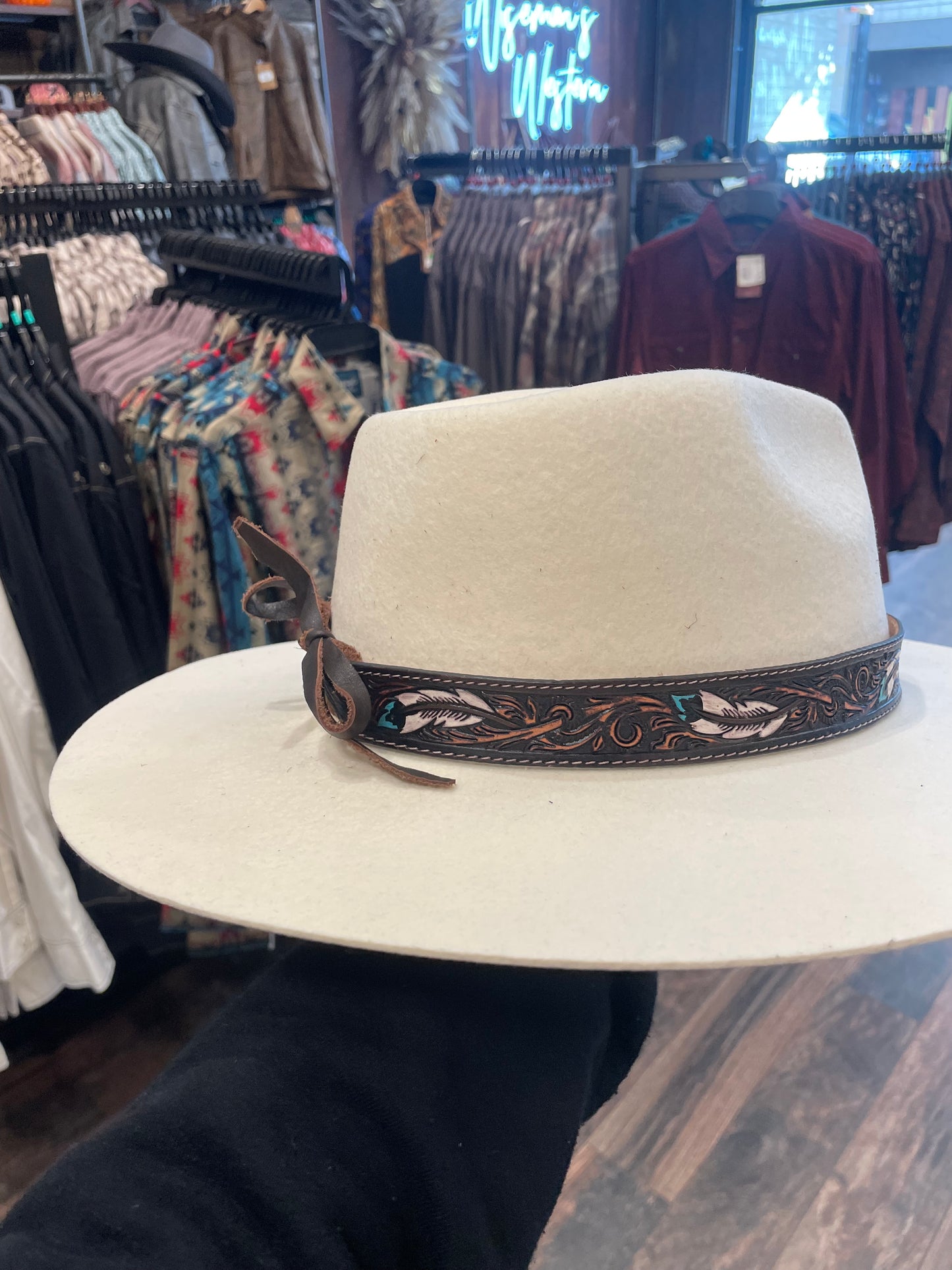 Tooled dark leather/white feather hat band