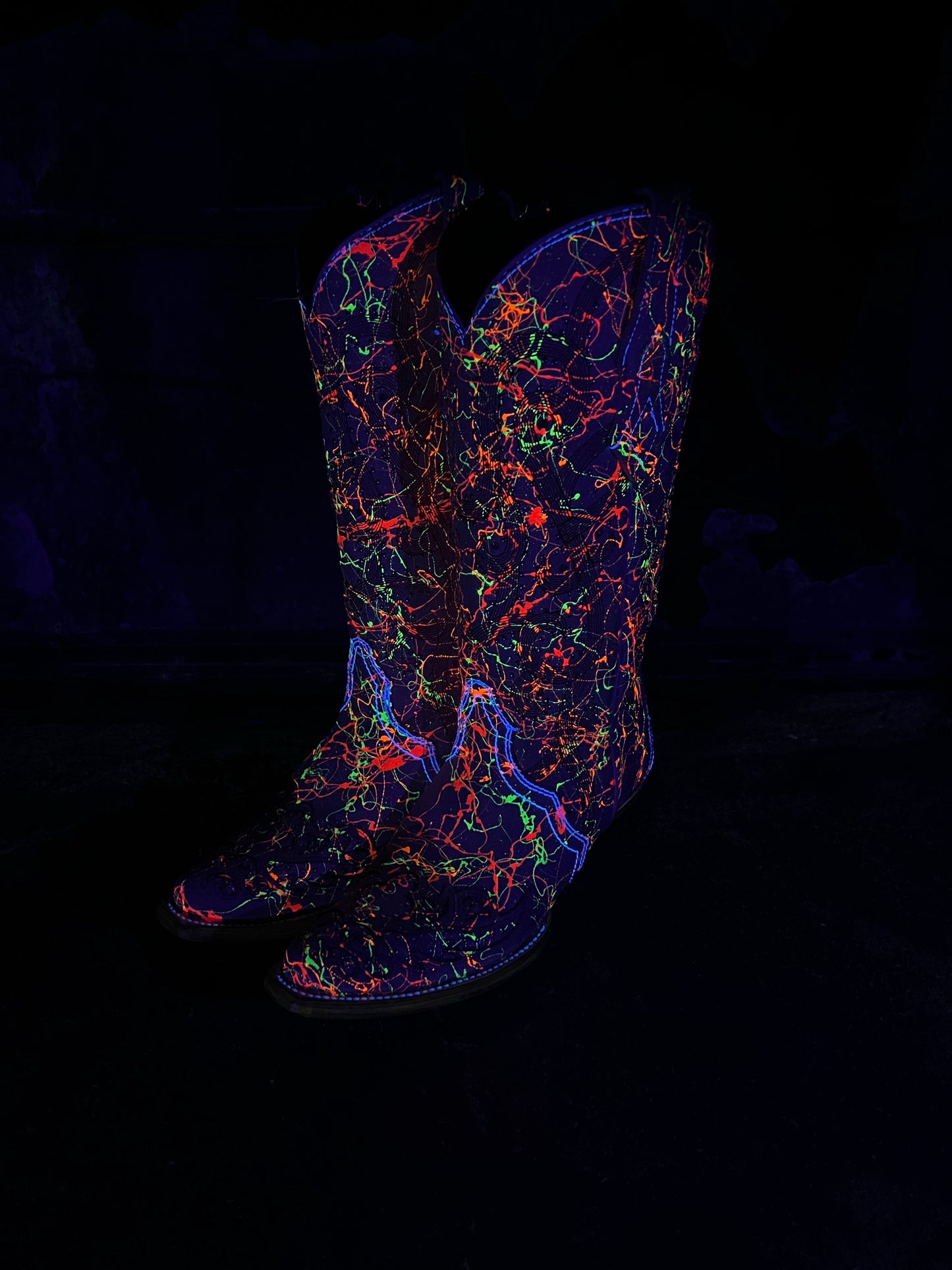 The Blazing Neon Black Light Boots Corral