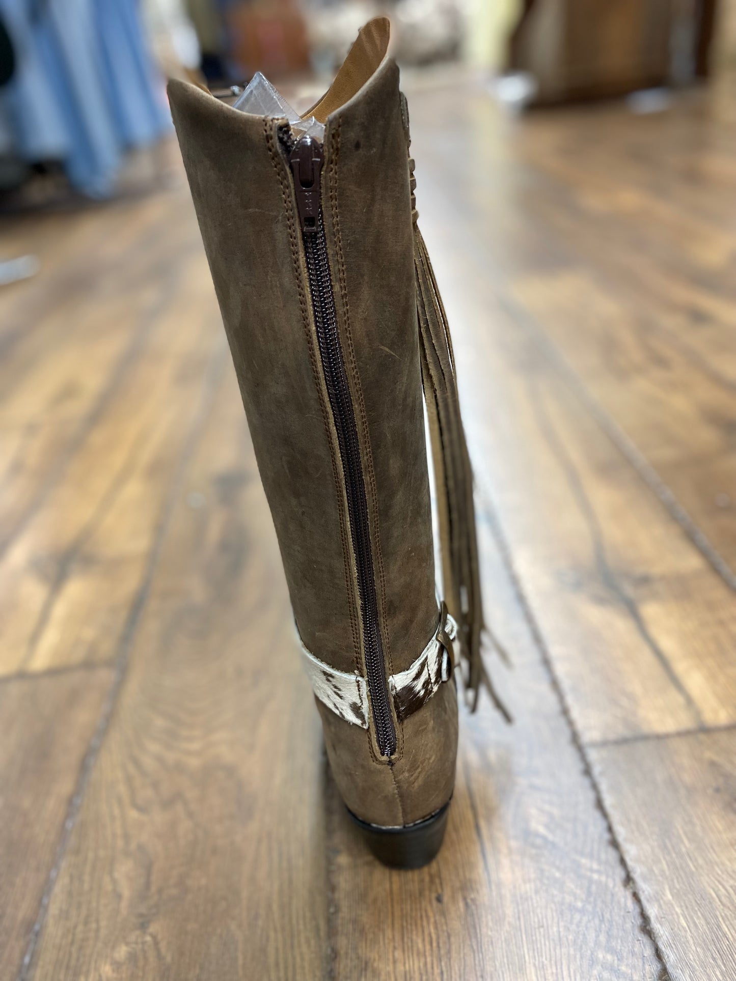 Agave sky tall women's boots with hair on hide accents and tassels zipper up the back