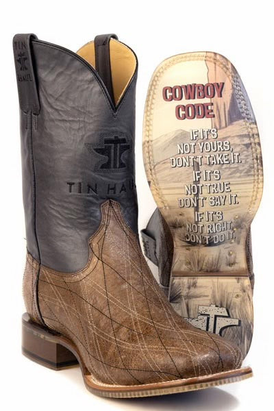 Brown and black cowboy boot with 'Tin Haul' branding on a white background