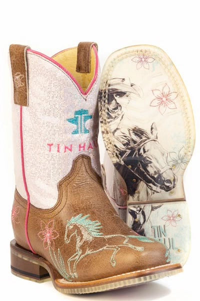 Pair of Tin Haul cowgirl boots with horse design on a white background