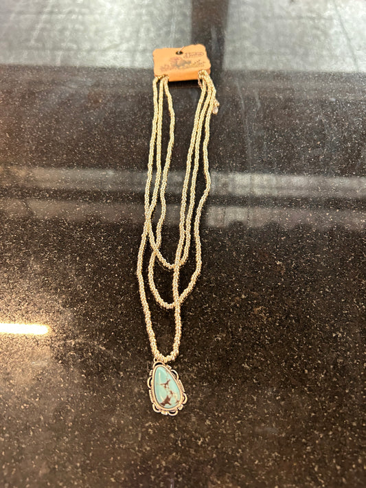 Justin Necklace Triple Strand/Stone Pendant